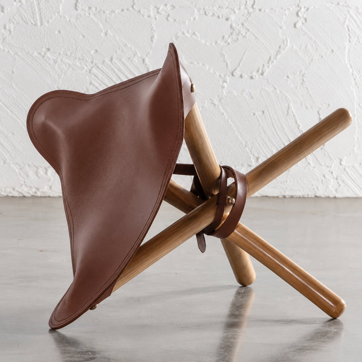 MALAND FOLDUP STOOL  |  NATURAL TEAK + TAN LEATHER HIDE
