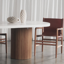ARIA VITOLO PILLAR OVAL DINING TABLE | BIANCO CIMENT | 260CM + TRIENT LEATHER DINING + CARVER CHAIR | NUTMEG HUSK + BRUSHED TEAK  