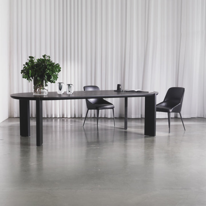 CASSAN ROUNDED DINING TABLE | BLACK NOIR WOOD GRAIN | 270CM + CARTER VEGAN LEATHER DINING CHAIR | NOIR BLACK