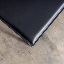 ATTRICI ARM CHAIR + FOOT REST   |  NOIR BLACK RECYCLED LEATHER CLOSE UP
