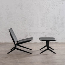 ATTRICI ARM CHAIR + FOOT REST   |  NOIR BLACK RECYCLED LEATHER SIDE VIEW