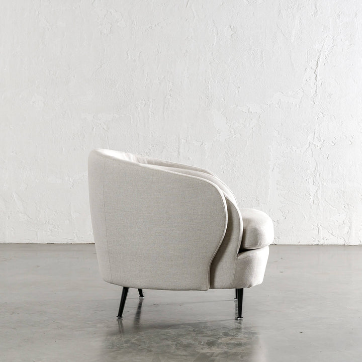 CARSON CURVE ARM CHAIR  |  JOVAN DOVE SIDE VIEW