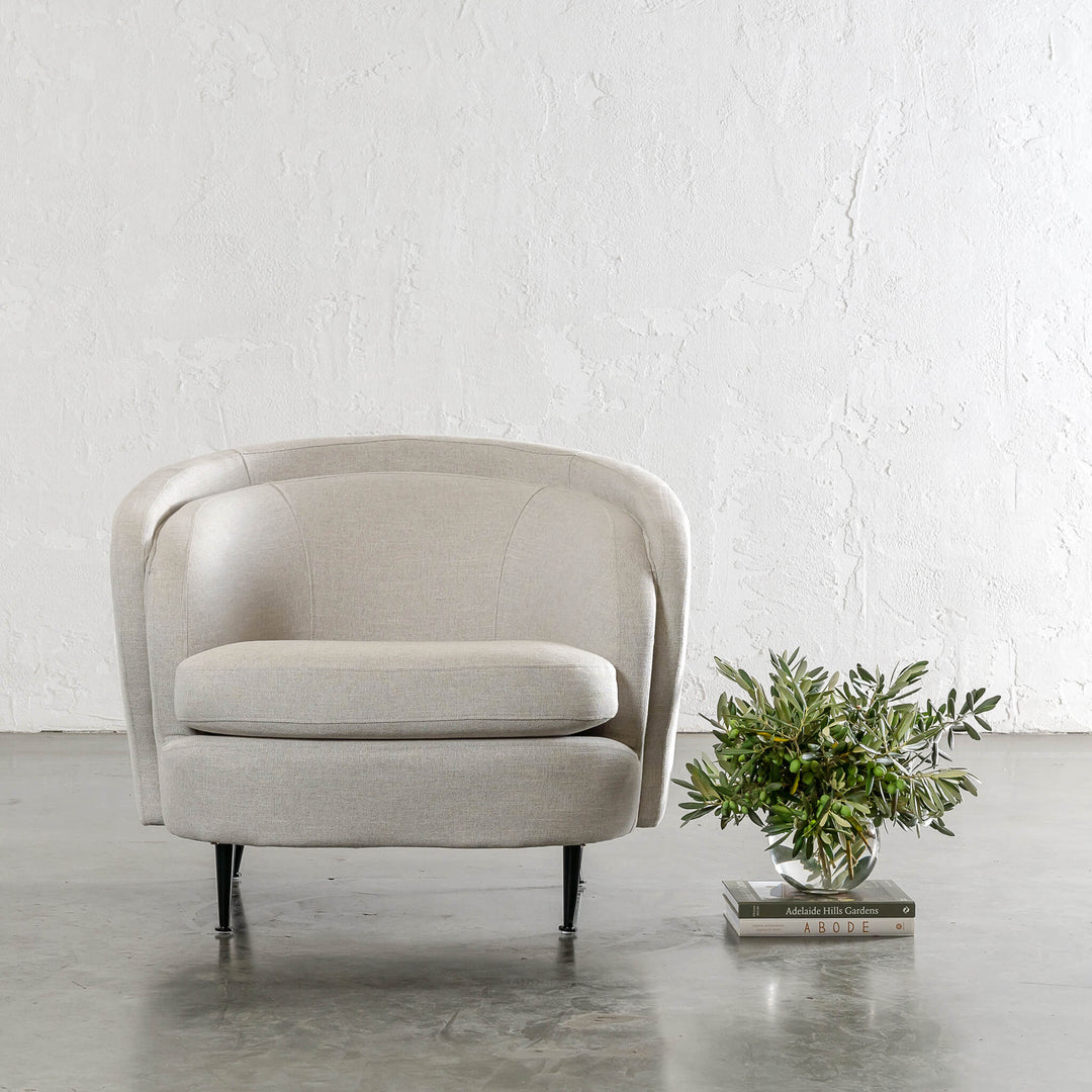 CARSON CURVE ARM CHAIR  |  JOVAN DOVE