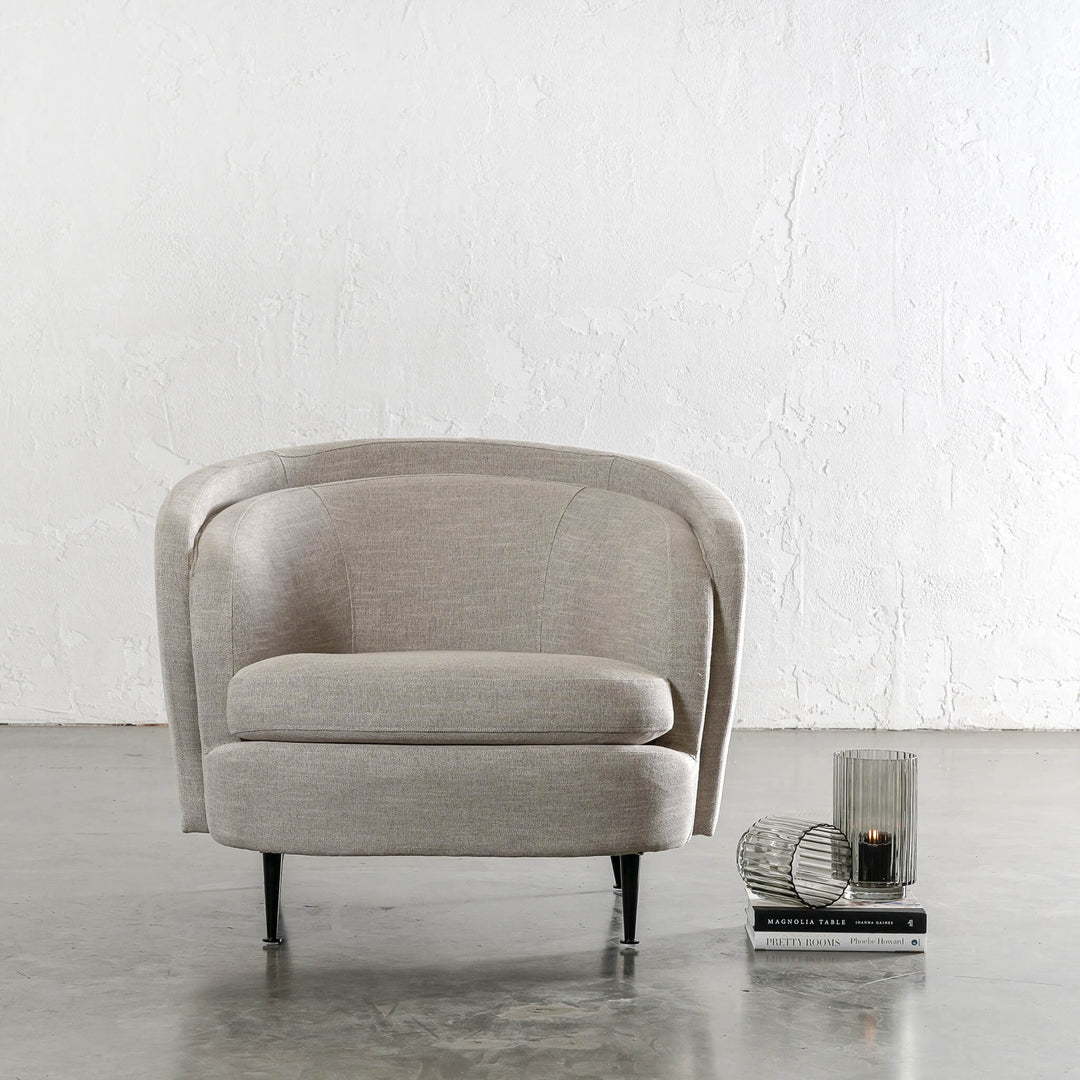 CARSON CURVE ARM CHAIR  |  JOVAN EARTH