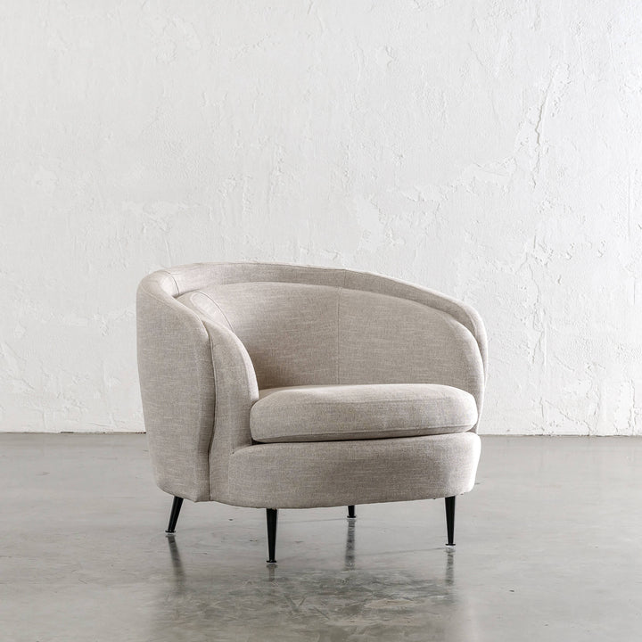 CARSON CURVE ARM CHAIR  |  JOVAN EARTH