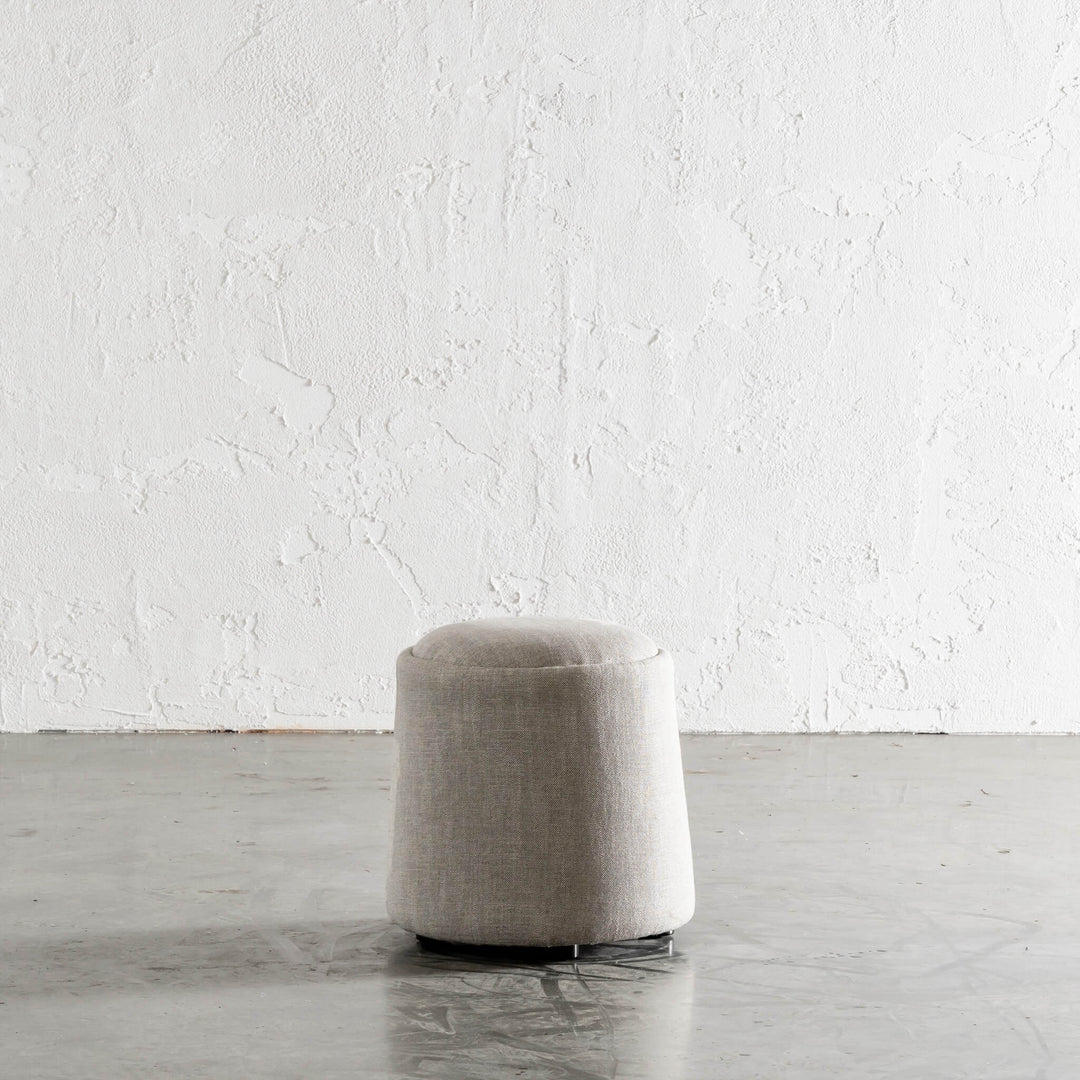 CARSON CURVE ROUND OTTOMAN  |  JOVAN EARTH MINIMAL