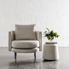 CARSON CURVE ROUND OTTOMAN  |  JOVAN DOVE NATURAL WITH ARMCHAIR