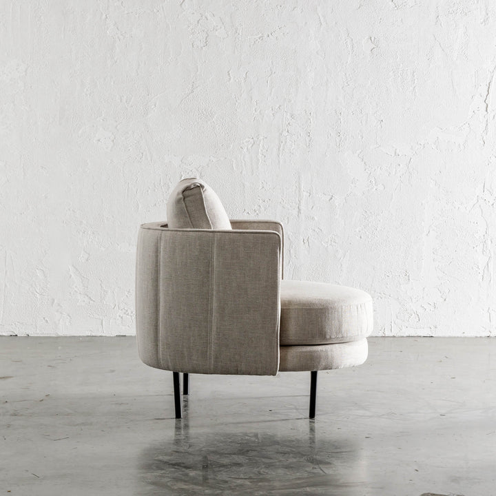 CARSON MODERNA CURVED RIBBED CHAIR  |  JOVAN EARTH SIDE VIEW