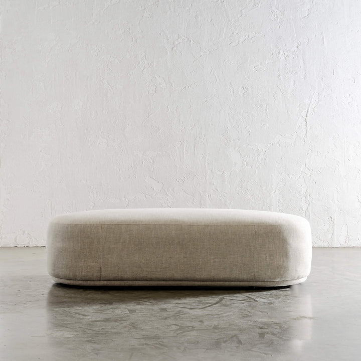 CARSON MODERNA CURVE RECTANGLE OTTOMAN  |  JOVAN EARTH SIDE VIEW