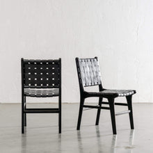 MALAND WOVEN LEATHER DINING CHAIR  |  BLACK ON BLACK FRAME ANGLED