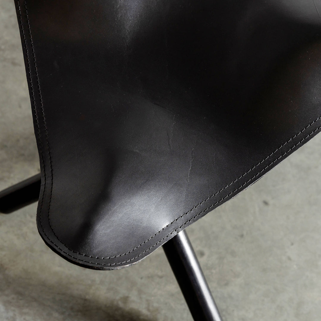 MALAND FOLDUP STOOL  |  BLACK ON BLACK LEATHER CLOSE UP