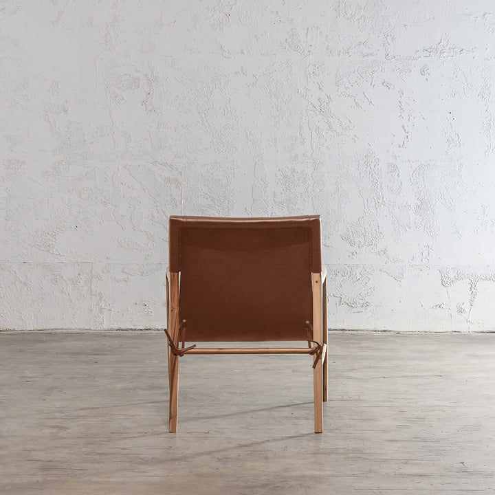 MALAND SLING LEATHER ARM CHAIR  |  TAN LEATHER REAR VIEW