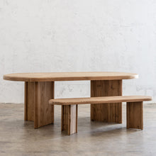 TRION INDOOR ROUNDED TEAK DINING TABLE | CLOSE UP